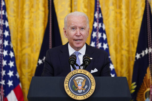 FILE - President Joe Biden speaks from the East Room of the White House in Washington, Thursday, July 29, 2021. An array of progressive and pro-White House groups plans to spend nearly $100 million to promote Biden’s agenda over the next month to pressure Congress while lawmakers are on their August recess. The push being announced Monday, Aug. 2 coupled with a wave of travel by the president’s top surrogates, is meant to promote and secure passage of Biden’s two-track infrastructure plan. (AP Photo/Susan Walsh, File)    PHOTO CREDIT: Susan Walsh