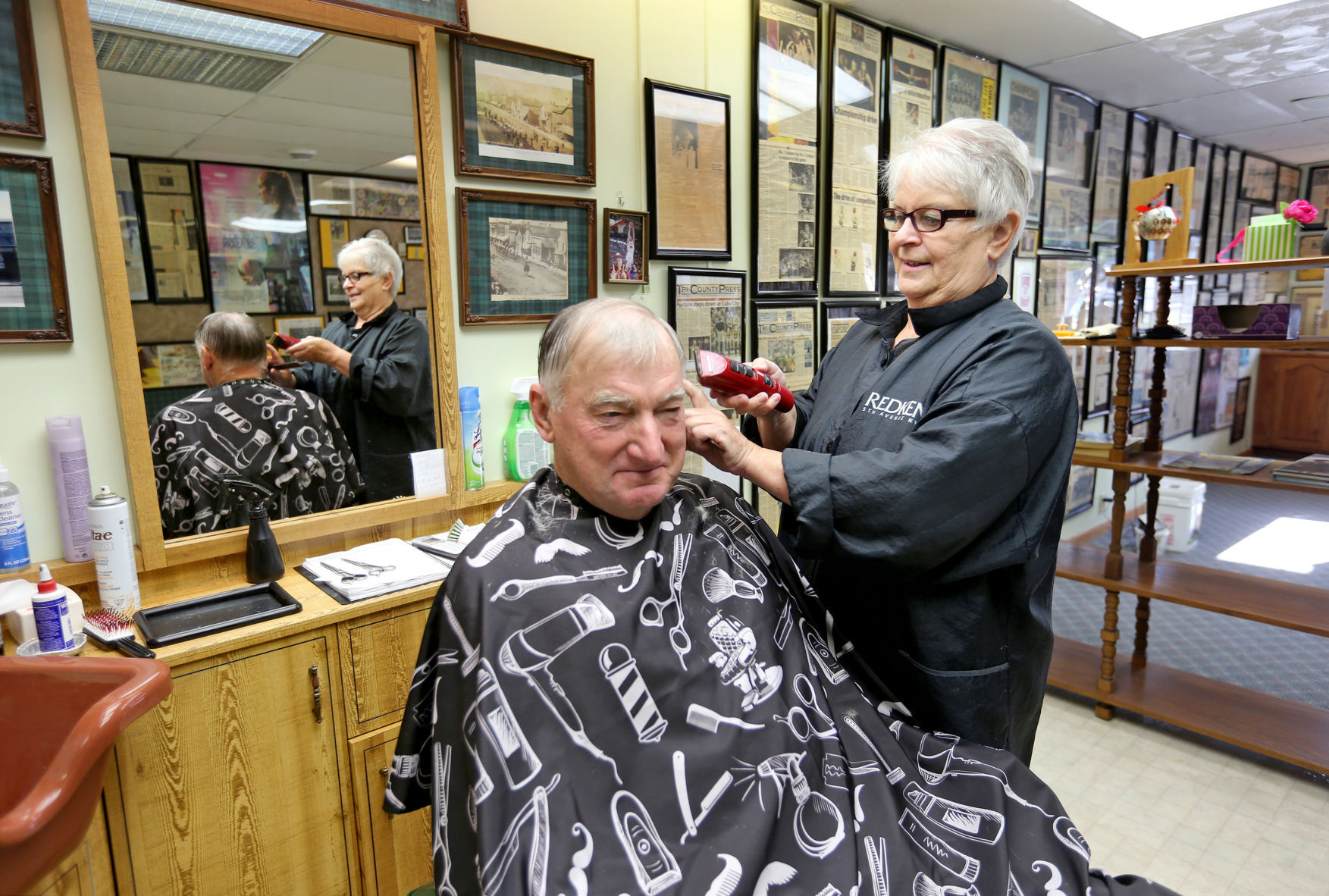 Joanie Von Glahn cuts hair for Glen Temperly, of Cuba City, Wis., at Joanie’s Hair Repair in Cuba City on Saturday. Von Glahn is retiring after 53 years in the industry.    PHOTO CREDIT: JESSICA REILLY