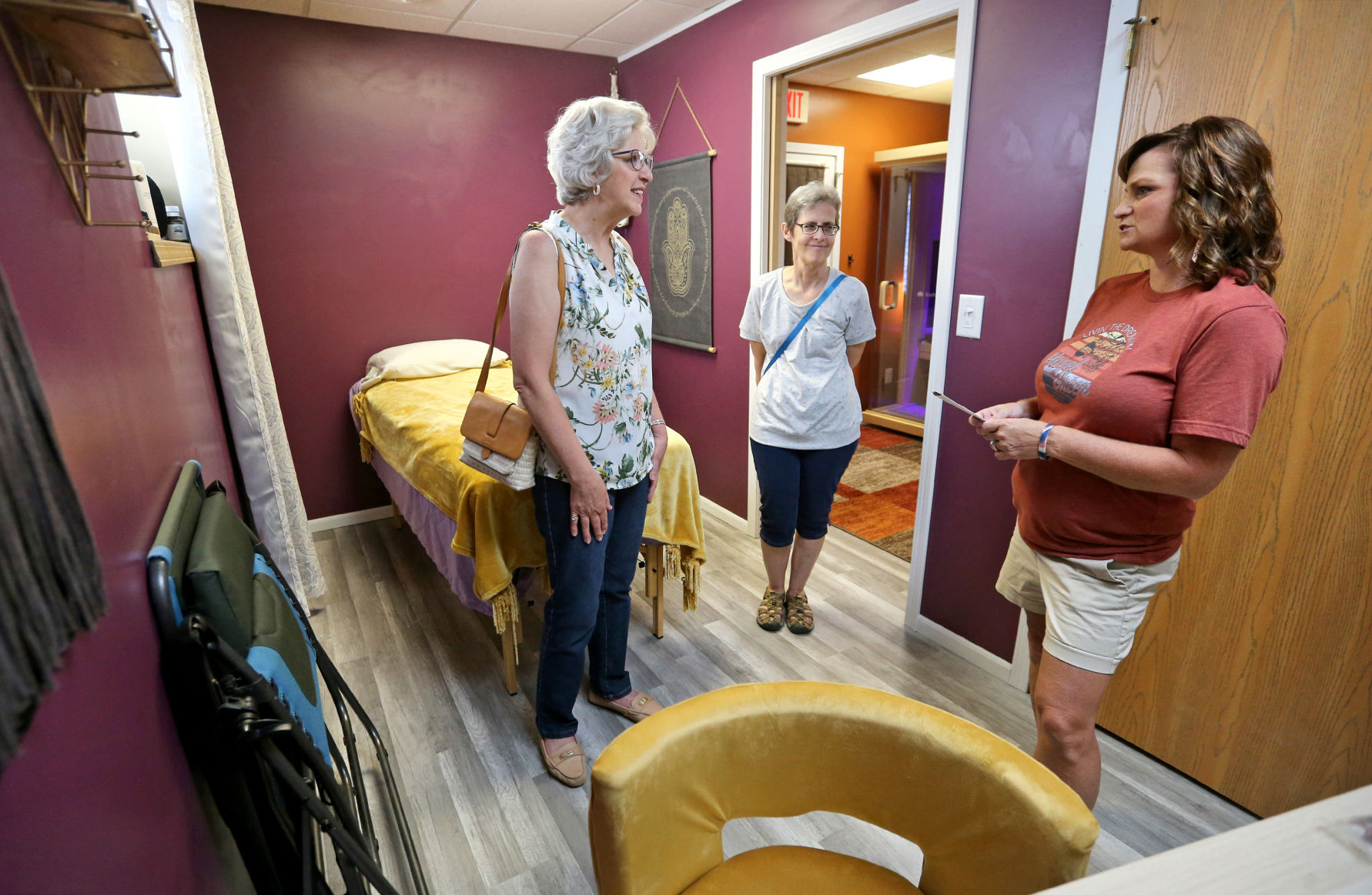 Amy Hendricks (far right) talks with Susan Anderson (far left), of Scales Mound, Ill., and Mary Meyer, of Galena, Ill., during an open house at In Harmony in Hazel Green, Wis., on Saturday, Aug. 14, 2021.    PHOTO CREDIT: JESSICA REILLY