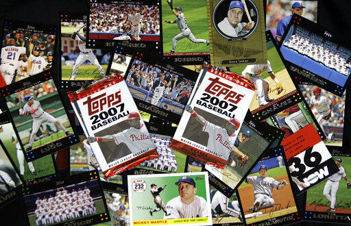 Major League Baseball is ending its 70-year relationship with trading card company Topps and will instead be working sports merchandise company Fanatics.     PHOTO CREDIT: Charles Krupa