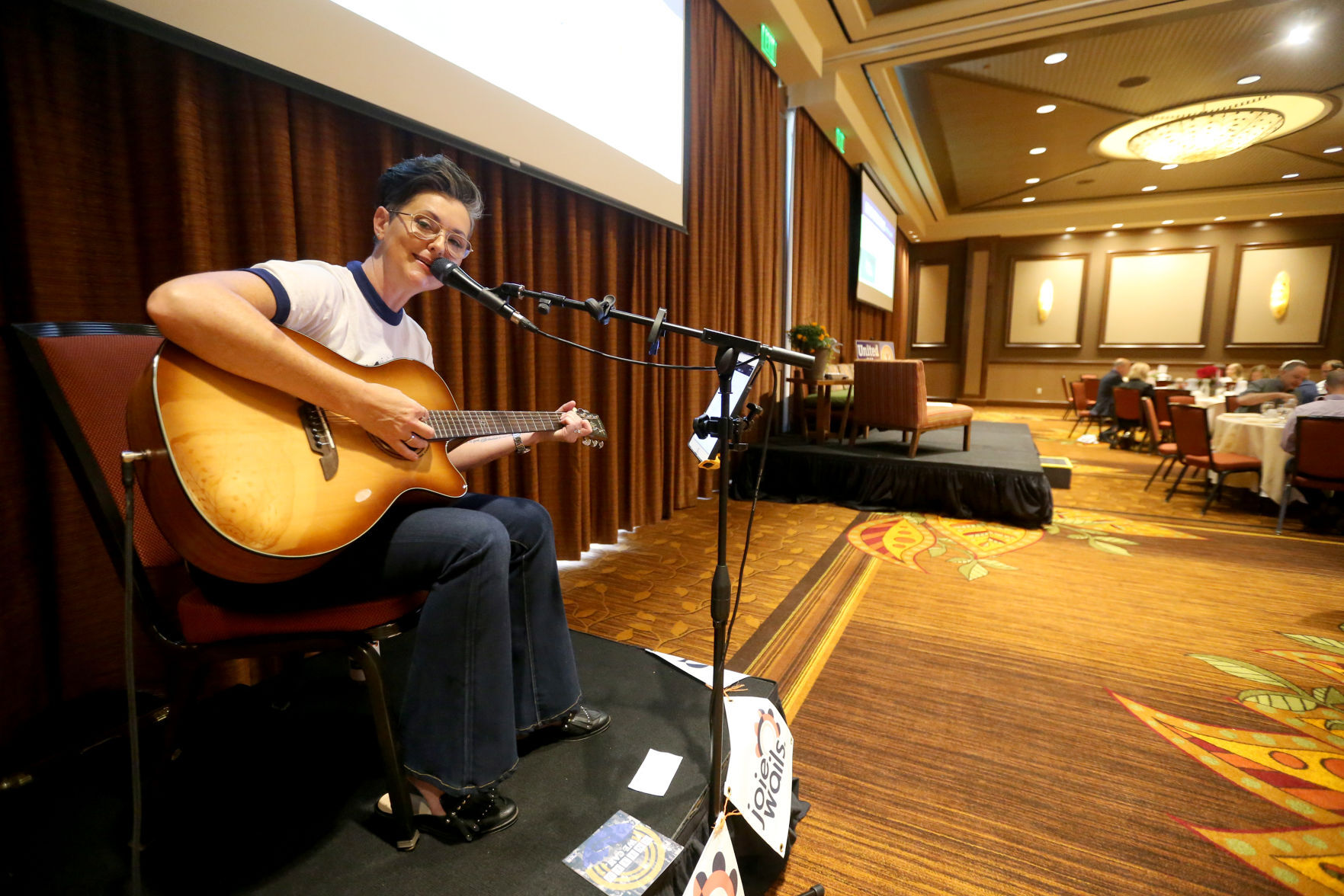 Joie Wails sings during United Way of Dubuque Area Tri-States