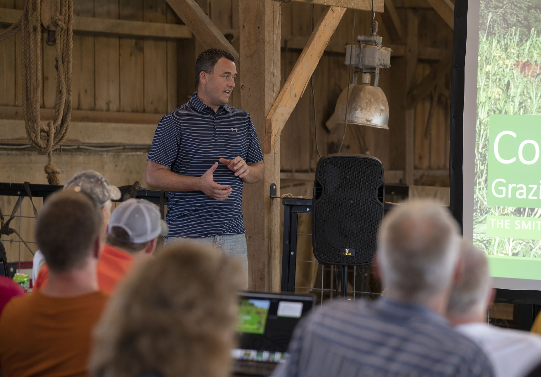Nick Smith speaks on his family farm during the Cover Crops and Grazing Field Day in rural Durango, Iowa on Wednesday.    PHOTO CREDIT: Stephen Gassman