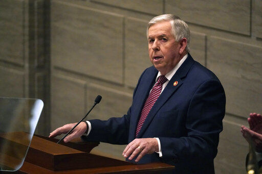 FILE - In this Jan. 27, 2021, file photo, Missouri Gov. Mike Parson delivers the State of the State address in Jefferson City, Mo. A judge on Tuesday, Aug. 31, sided with Gov. Parson in his decision in June to end several federal programs that provided enhanced jobless benefits for Missourians. The Republican governor said it was meant to prod people back to work, but Missouri Jobs With Justice, which filed suit on behalf of unemployed Missourians, said the decision was damaging to many people who lost work during the COVID-19 pandemic. AP Photo/Jeff Roberson, File)    PHOTO CREDIT: Jeff Roberson
