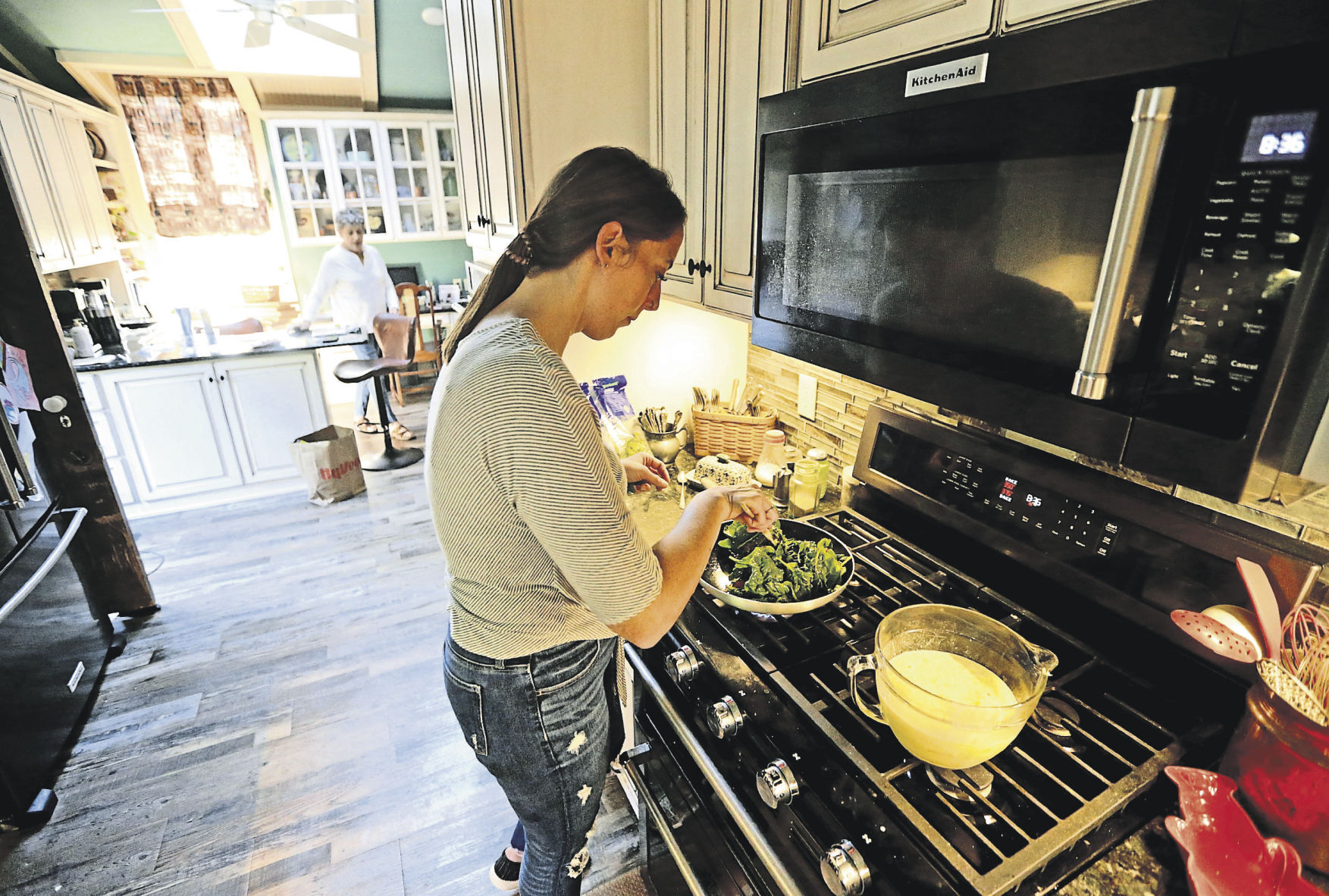 Katie Burcham prepares breakfast for guests at The Steamboat House Bed & Breakfast in Galena, Ill.    PHOTO CREDIT: JESSICA REILLY