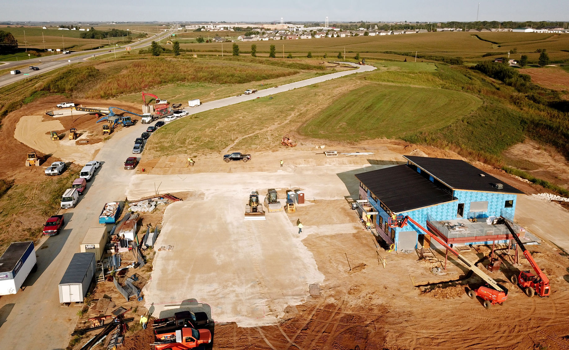 Construction continues on a new Jumble Coffee Co. location (left) and the Darkbird Taproom (right) along Thunder Valley Drive between Thunder Hills and Cox Springs roads in Peosta, Iowa, on Friday.    PHOTO CREDIT: JESSICA REILLY