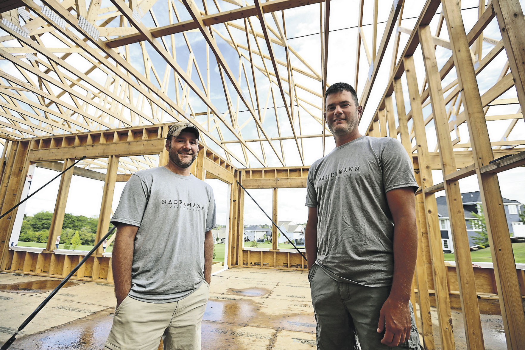 Terry Nadermann (left) and Tony Nadermann, of Nadermann Development, started building spec homes in 2004 while working other jobs. The business grew, and by 2006, they created their business. They build about 10 houses every year.    PHOTO CREDIT: JESSICA REILLY