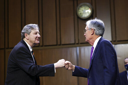 Sen. John Kennedy, R-La., greets Federal Reserve Chairman Jerome Powell before a Senate Banking, Housing and Urban Affairs Committee hearing on the CARES Act on Capitol Hill, Tuesday, Sept. 28, 2021 in Washington. (Kevin Dietsch/Pool via AP)    PHOTO CREDIT: Kevin Dietsch