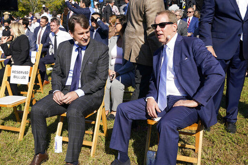 Jim Farley, Ford president and CEO, left, and Ford Executive Chairman Bill Ford, right, talk before a presentation on the planned factory to build electric F-Series trucks and the batteries to power future electric Ford and Lincoln vehicles Tuesday, Sept. 28, 2021, in Memphis, Tenn. The plant in Tennessee is to be built near Stanton, Tenn. (AP Photo/Mark Humphrey)    PHOTO CREDIT: Mark Humphrey