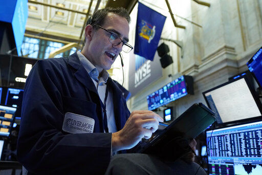 Trader Gregory Rowe works on the floor of the New York Stock Exchange, Wednesday, Sept. 29, 2021. Stocks rose modestly in morning trading on Wall Street Wednesday as the market regains its footing following a sharp drop a day earlier. (AP Photo/Richard Drew)    PHOTO CREDIT: Richard Drew