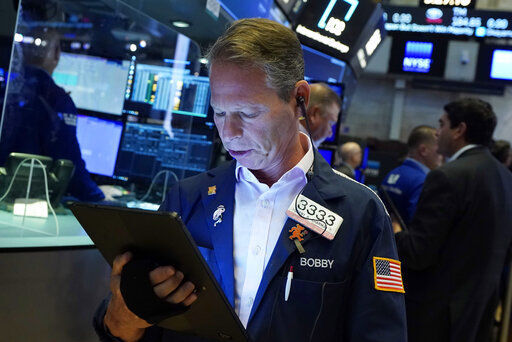 Trader Robert Charmak works on the floor of the New York Stock Exchange, Wednesday, Sept. 29, 2021. Stocks rose modestly in morning trading on Wall Street Wednesday as the market regains its footing following a sharp drop a day earlier. (AP Photo/Richard Drew)    PHOTO CREDIT: Richard Drew