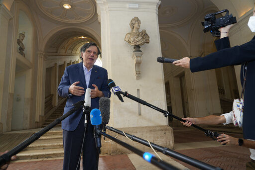 Italian theoretical physicist Giorgio Parisi speaks to journalists as he arrives at the Accademia dei Lincei , Tuesday, Oct. 5, 2021, in Rome, after being awarded the 2021 Nobel Prize for Physics, together with Syukuro Manabe and Klaus Hasselmann, by The Royal Swedish Academy of Sciences in Stockholm. (AP Photo/Domenico Stinellis)    PHOTO CREDIT: Domenico Stinellis