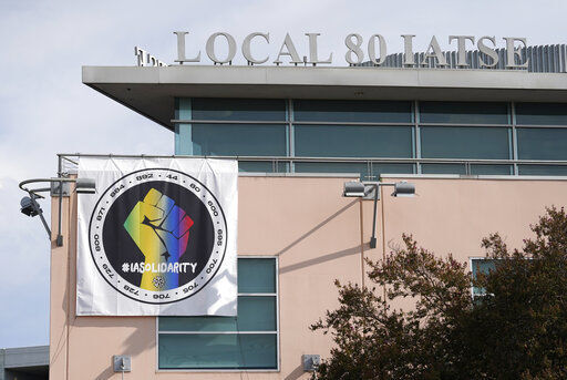 A poster advocating union solidarity hangs from the office building housing The International Alliance of Theatrical Stage Employees Local 80. A major Hollywood strike could be on the horizon for some 60,000 behind-the-scenes workers in the entertainment industry.    PHOTO CREDIT: Chris Pizzello