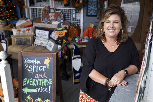 Ginger Pigg in her gift boutique The Perfect Pigg in Cumming, Ga. on Thursday afternoon, Oct. 22, 2021. She says she is struggling to get products to her store in a timely way. (AP Photo/Ben Gray)    PHOTO CREDIT: Ben Gray