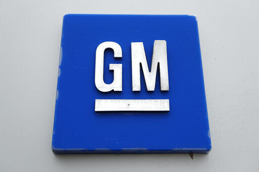 This Jan. 27, 2020 photo shows the General Motors logo. High prices for trucks and SUVs helped General Motors post a $2.4 billion third-quarter profit despite factory closures due to a shortage of computer chips and other parts. But the profit was 40% lower than the $4 billion GM made during the same period last year as sales slumped last quarter and the company lost market share in the U.S., its most profitable country. (AP Photo/Paul Sancya)    PHOTO CREDIT: Paul Sancya
