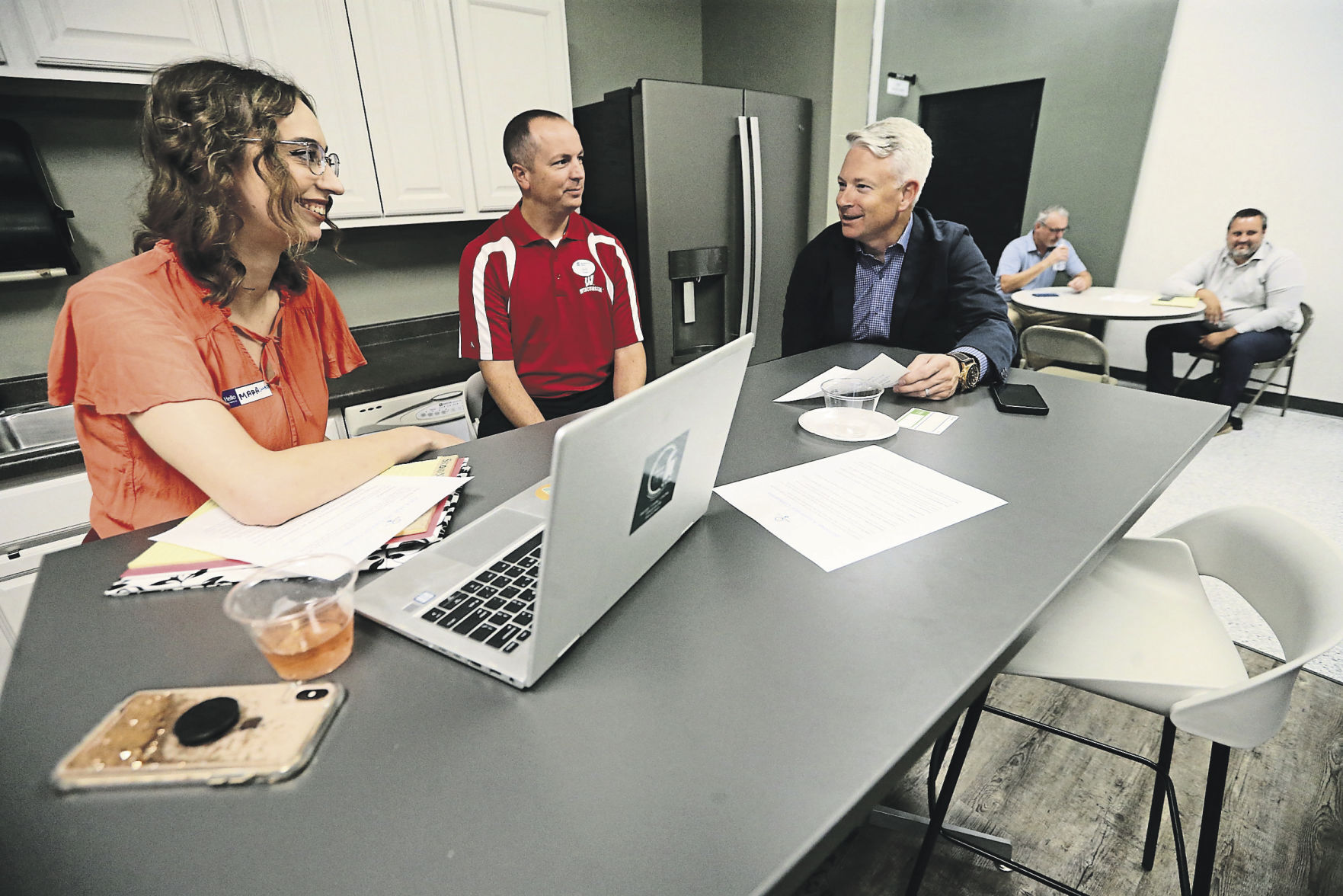 Mara Keyes (from left), Nicholas Felder and John Miller discuss ideas during the grand opening of the Innovation Driving Entrepreneurship Accelerator Hub, known as the IDEA Hub, at Platteville Business Incubator in Platteville, Wis., on Monday, Oct. 4, 2021.    PHOTO CREDIT: JESSICA REILLY