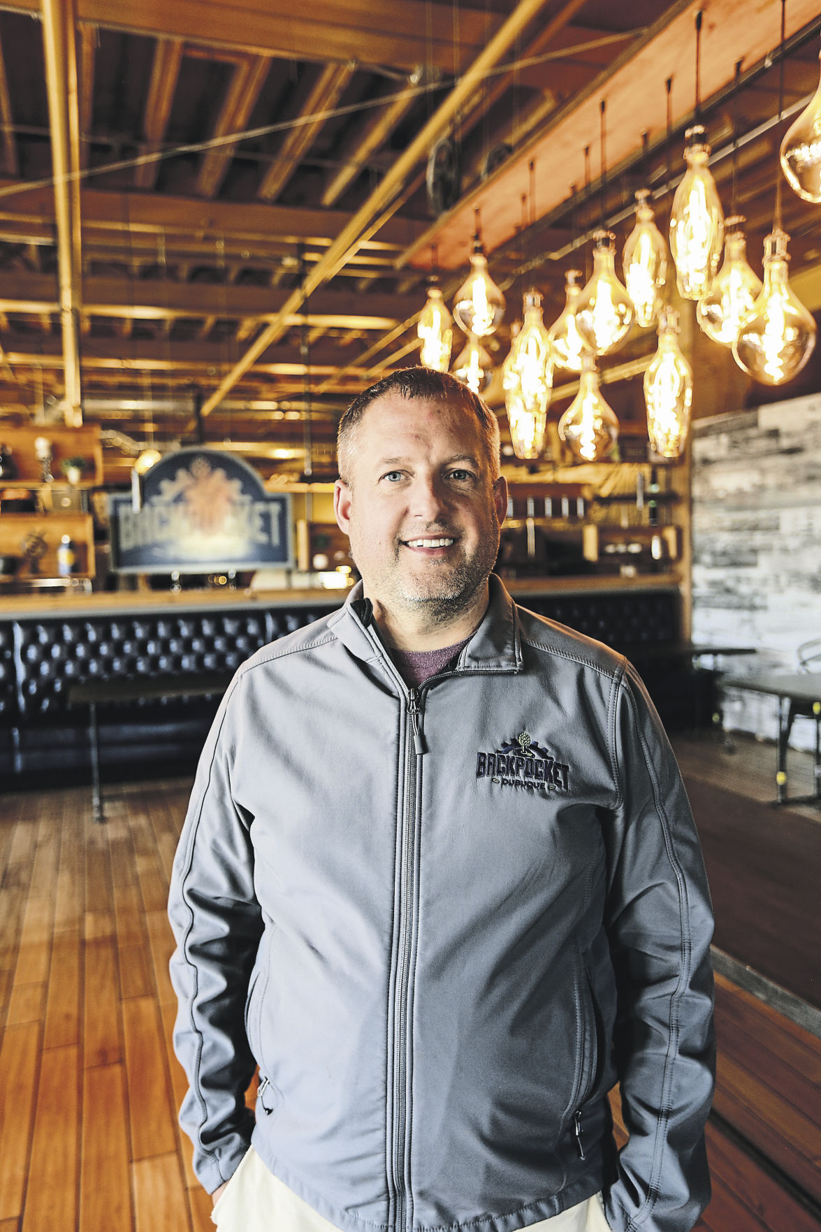 Jacob Simmons, is the owner of Backpocket Dubuque.    PHOTO CREDIT: Dave Kettering