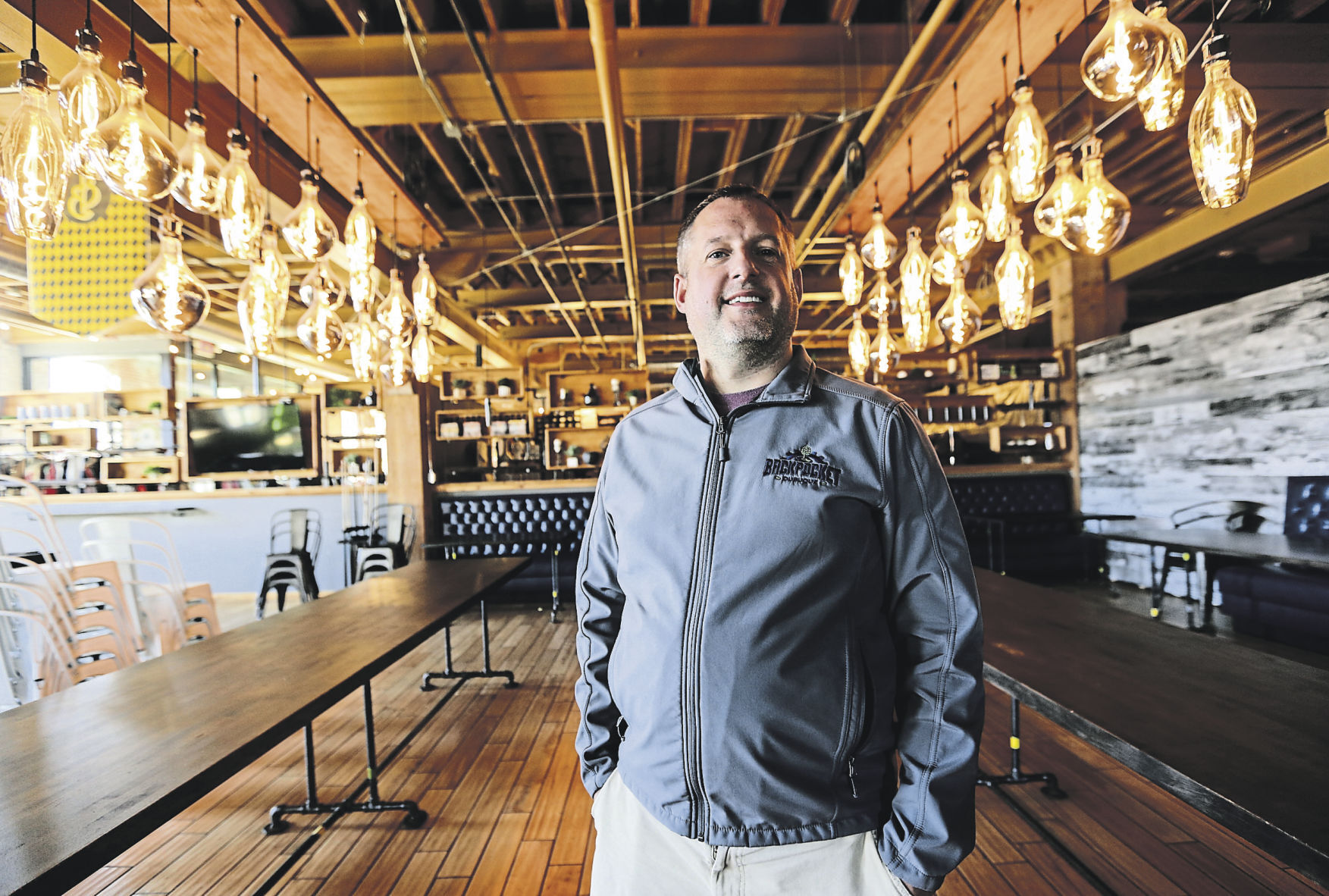 Jacob Simmons, is the owner of Backpocket Dubuque.    PHOTO CREDIT: Dave Kettering