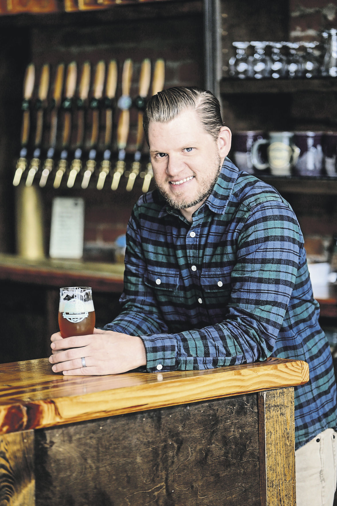 Jay Jubeck is the owner of Jubeck New World Brewing in Dubuque.    PHOTO CREDIT: Dave Kettering