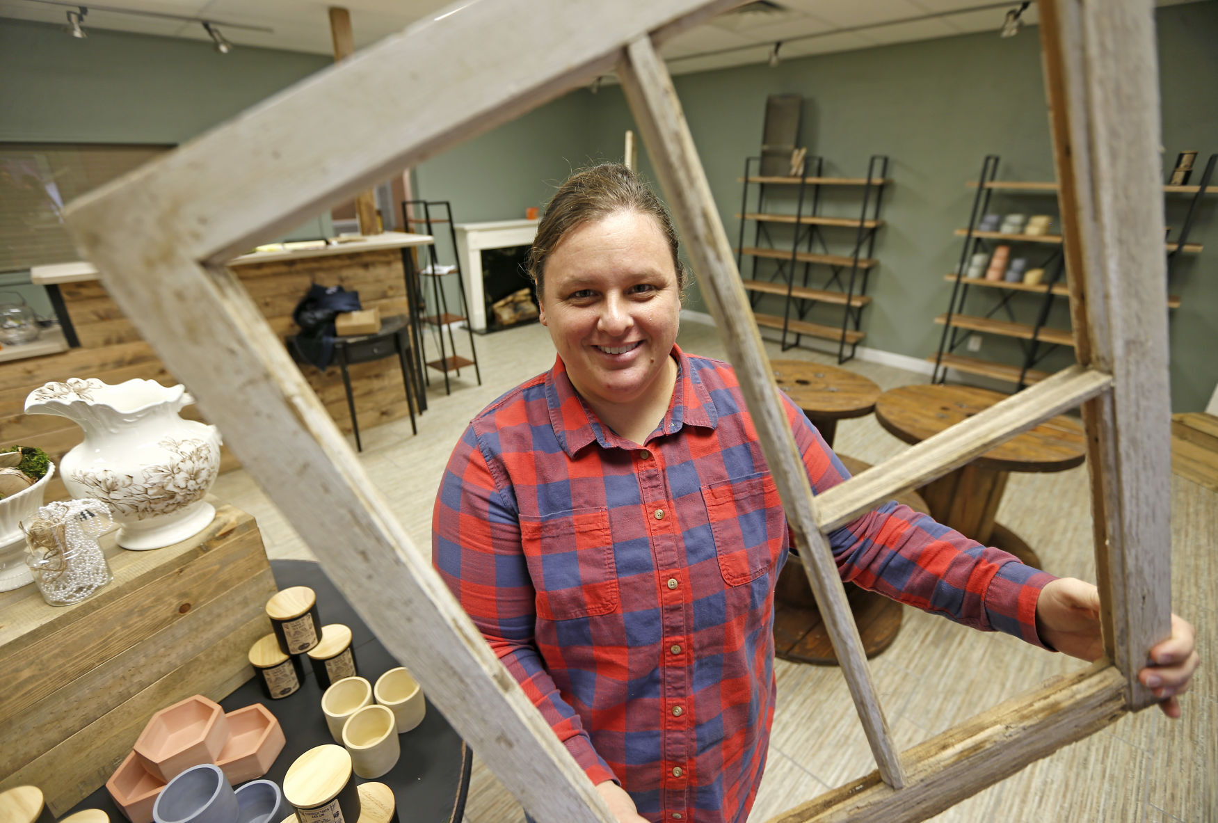Katey Grund, owner of Dubuque Flower Company, will open her new store at 3340 Center Grove Drive in Dubuque.    PHOTO CREDIT: Dave Kettering
