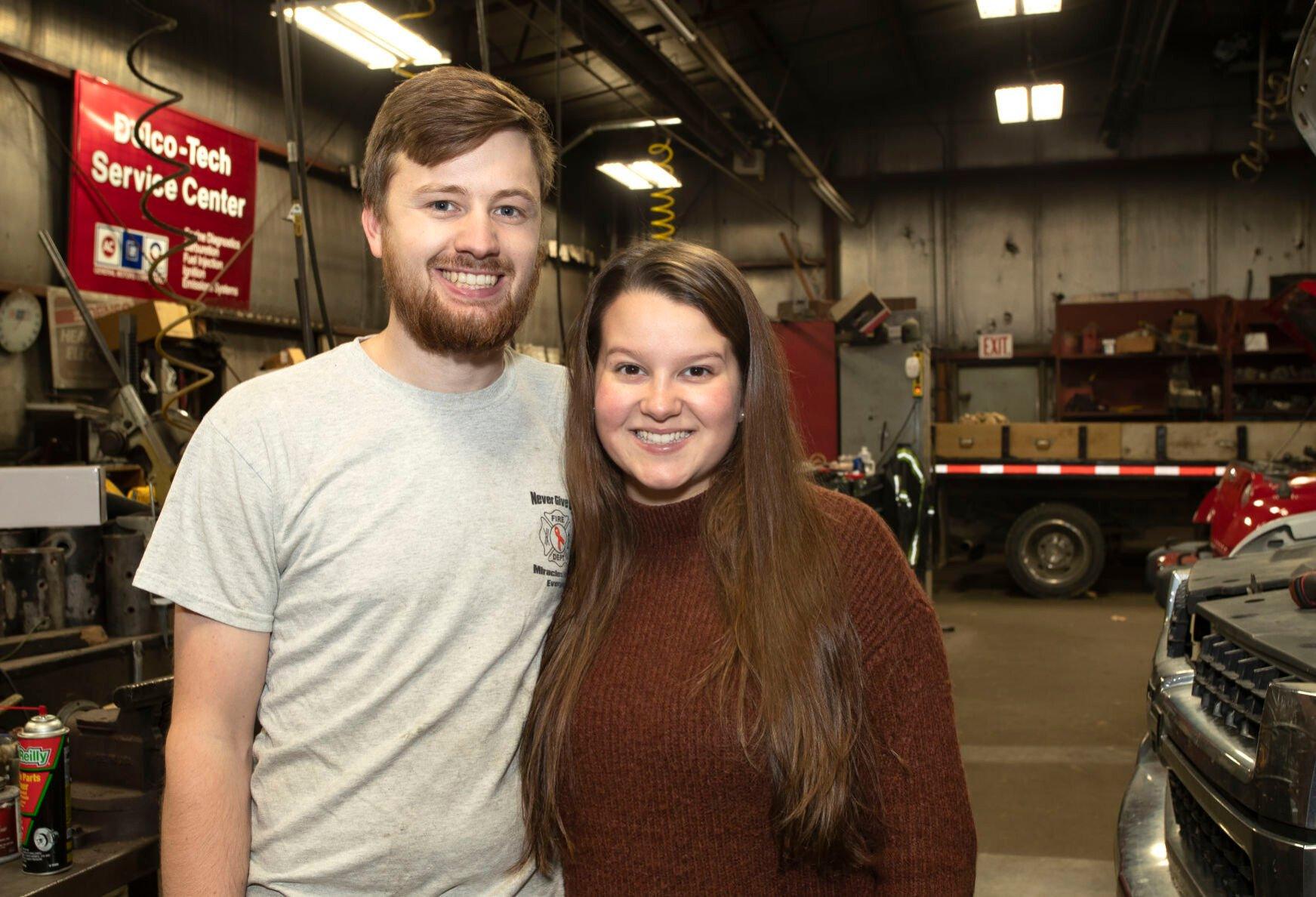 The new owners of Sheehan Auto, Luke and Emma Steele, in their shop in East Dubuque, Ill., on Monday.    PHOTO CREDIT: Stephen Gassman