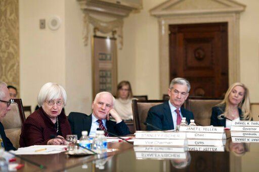 FILE - Federal Reserve Board Chair Janet Yellen, second from left, oversees an open meeting of the board with board members; Vice Chair Stanley Fischer, Yellen, Daniel Tarullo, Jerome Powell, and Lael Brainard, in Washington, Thursday, Dec. 15, 2016. President Joe Biden announced Monday, Nov. 22, 2021 that he’s nominating Powell for a second term as Federal Reserve chair, endorsing his stewardship of the economy through a brutal pandemic recession in which the Fed’s ultra-low rate policies helped bolster confidence and revitalize the job market. Biden also said he would nominate Brainard, the lone Democrat on the Fed’s Board of Governors and the preferred alternative to Powell for many progressives, as Vice Chair. (AP Photo/Cliff Owen, File)    PHOTO CREDIT: Cliff Owen