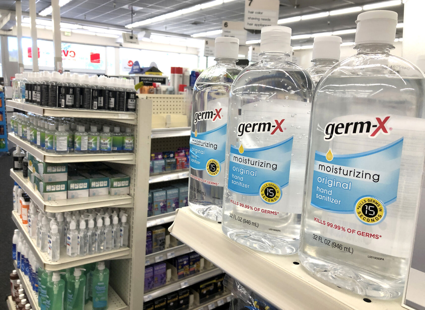 Containers of hand sanitizer are displayed on a shelf at a CVS store on May 24, 2021 in San Anselmo, California. You can buy COVID supplies, such as hand sanitizer and rapid tests, as well as other health care related items, with funds from your FSA.     PHOTO CREDIT: Tribune News Service