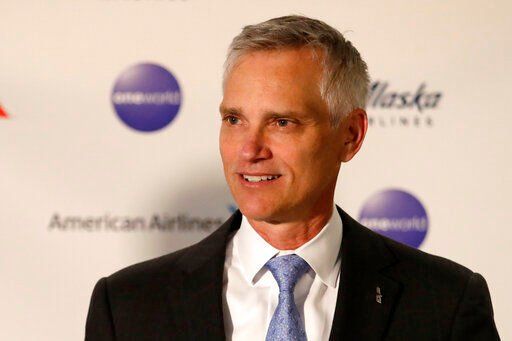 FILE - American Airlines President Robert Isom speaks at a news conference about the company