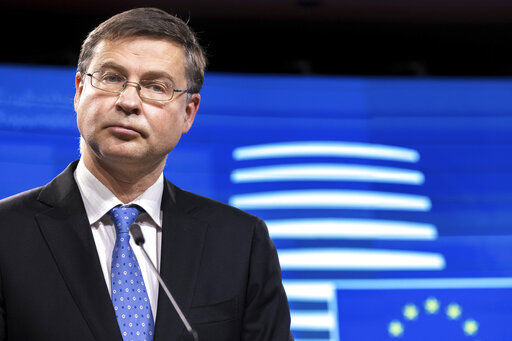 FILE - EU Trade Commissioner Valdis Dombrovskis speaks during a press conference after the Economic and Financial Affairs Council meeting at the Europa building in Brussels, on Dec. 7, 2021. The European Union wants to set up a system of trade sanctions that it could impose on any foreign power it accuses of trying to coerce the 27-country bloc for economic or political gain. The EU’s executive branch, the European Commission, wants to be able to react without needing the endorsement of all member nations when a person, company or country tries to strong-arm the bloc. It says such a plan could be used in situations like China’s diplomatic and trade spat with Lithuania over Taiwan. (AP Photo/Olivier Matthys, File)    PHOTO CREDIT: Olivier Matthys
