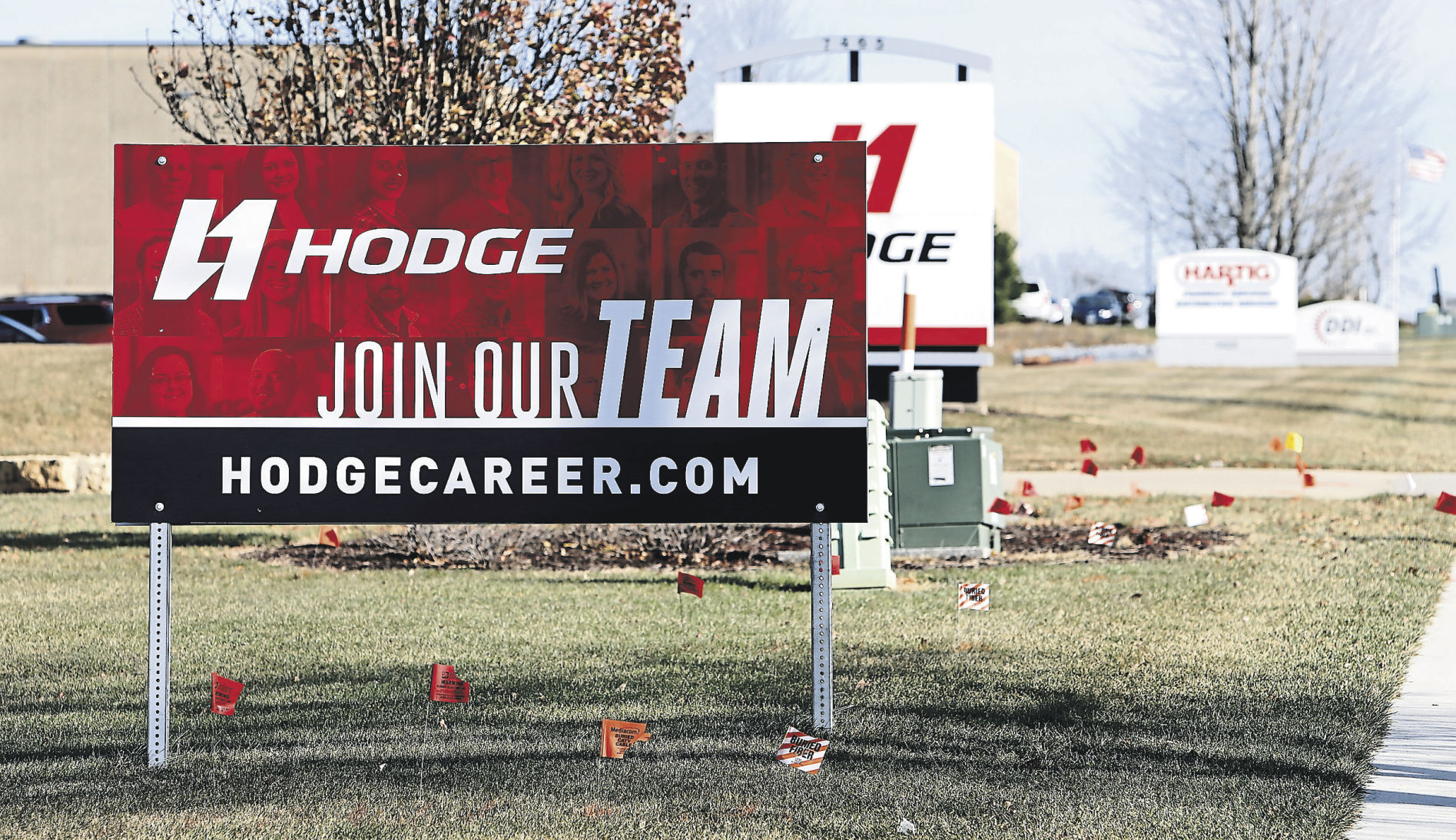 Help wanted signs such as this one posted by Hodge Co. along Chavenelle Road in Dubuque are among many in the tri-state area.    PHOTO CREDIT: Dave Kettering