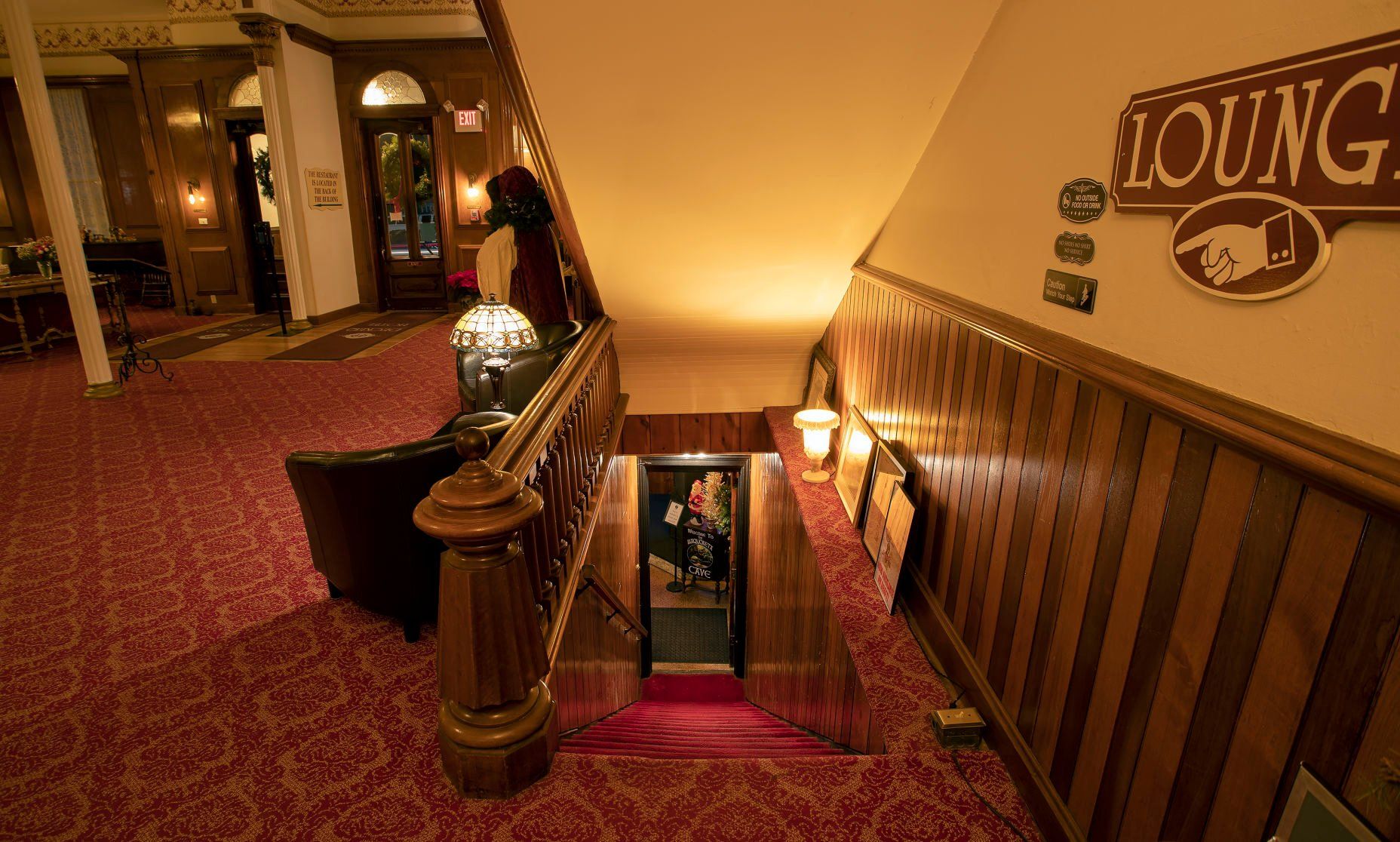 A stairwell leads to The Maquoketa Cave bar at Decker House Hotel in Maquoketa, Iowa, on Thursday, Dec. 23, 2021.    PHOTO CREDIT: Stephen Gassman