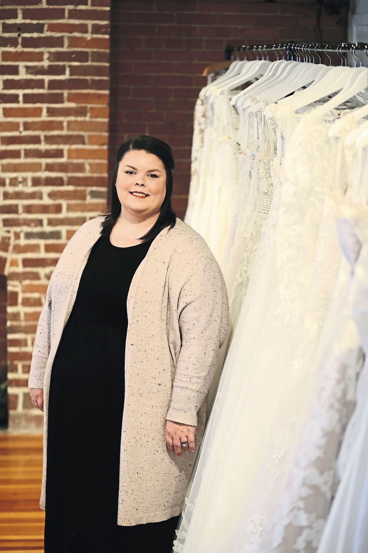 Shelby Duggan owns Vintage Chic Bridal Boutique in Dubuque.    PHOTO CREDIT: JESSICA REILLY