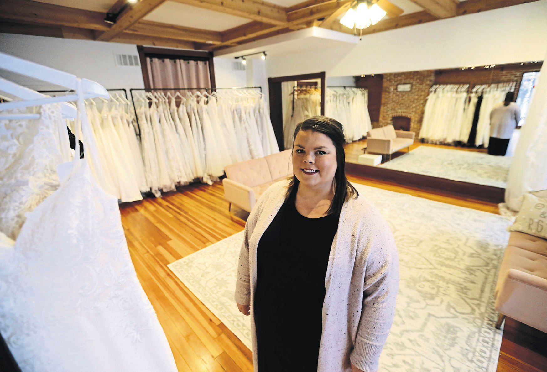 Shelby Duggan owns Vintage Chic Bridal Boutique in Dubuque. Photo taken on Thursday, Dec. 9, 2021.    PHOTO CREDIT: JESSICA REILLY