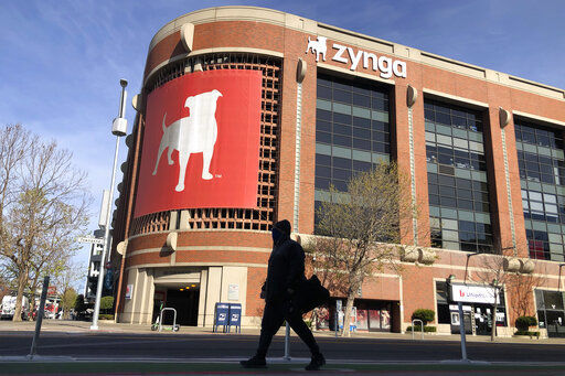  Take-Two Interactive, maker of Grand Theft Auto and Red Dead Redemption, is buying Zynga, maker of FarmVille and Words With Friends, in a cash-and-stock deal with an enterprise value of about $12.7 billion.     PHOTO CREDIT: Jeff Chiu