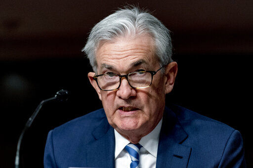 Federal Reserve Chairman Jerome Powell speaks during a congressional hearing. Powell said high inflation is imposing a burden on American families.    PHOTO CREDIT: Andrew Harnik