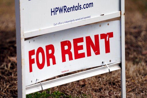 A for rent sign is displayed along a neighborhood street in Mebane, N.C., Wednesday, Feb. 10, 2021. Prices paid by U.S. consumers jumped in December 2021 compared to a year earlier, the latest evidence that rising costs for food, gas, rent and other necessities are heightening the financial pressures on America