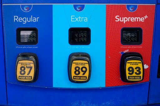 Gas prices are shown at a gas station, Wednesday, Oct. 20, 2021, in Miami. Prices paid by U.S. consumers jumped in December 2021 compared to a year earlier, the latest evidence that rising costs for food, gas, rent and other necessities are heightening the financial pressures on America