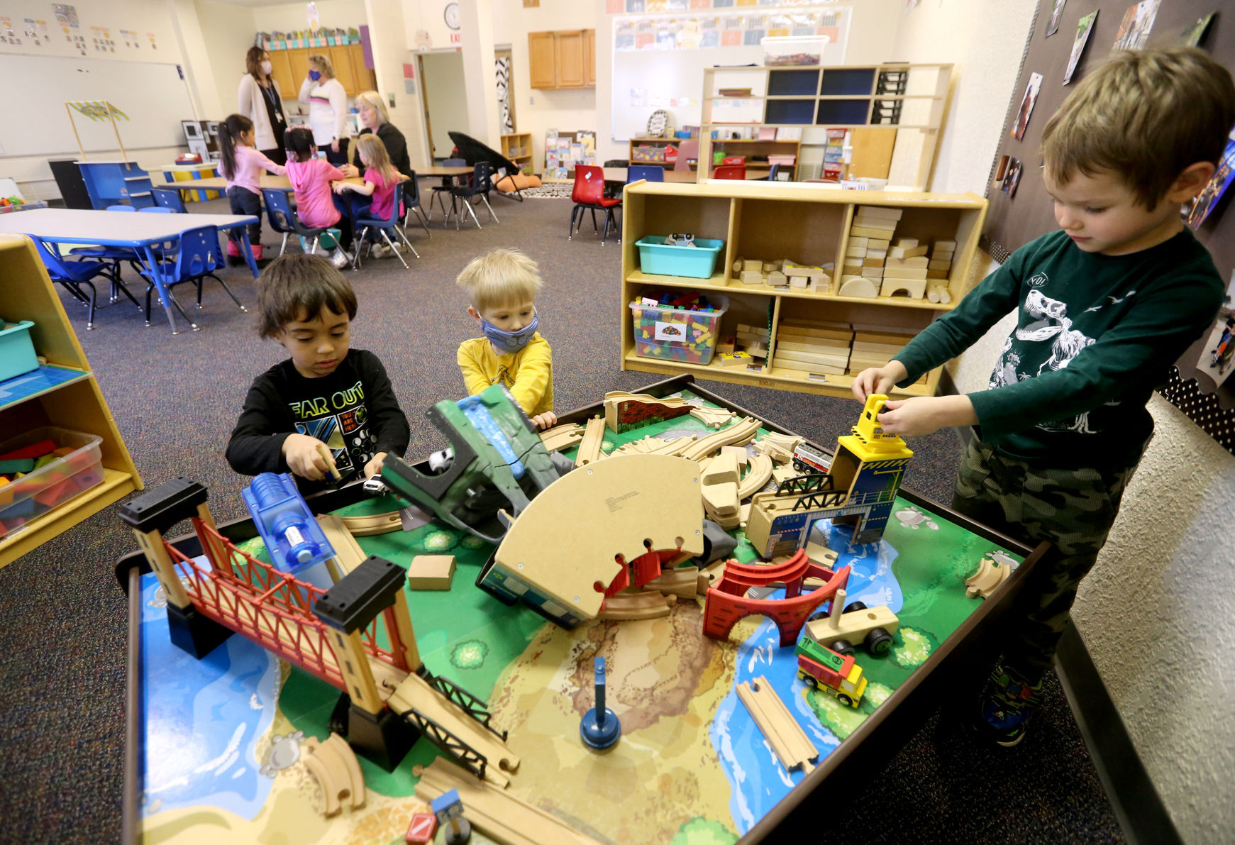Corey Southall (from left), Eric Taylor, and Lucas Foht, all 4, play at Holy Ghost Early Childhood Center in Dubuque on Thursday, Jan. 13, 2022.    PHOTO CREDIT: JESSICA REILLY