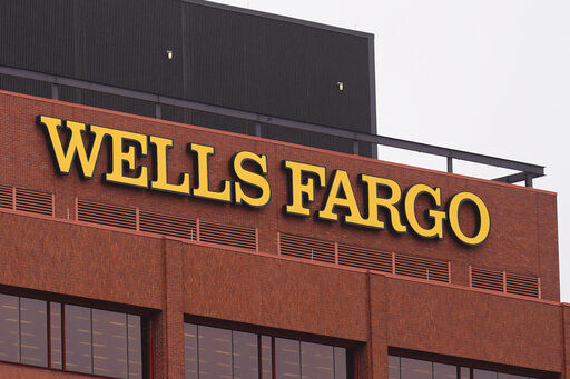 Wells Fargo easily beat Wall Street targets today in the fourth quarter, just as interest rates appear poised to take off and further boost the nation’s largest mortgage lender.     PHOTO CREDIT: Matt Rourke