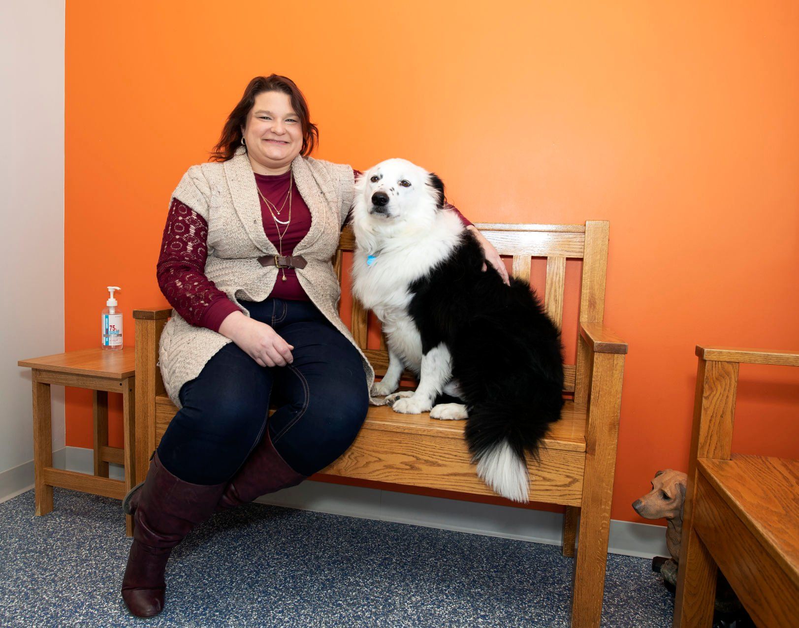 Dr. Mackenzie Hellert and her dog Martin sit in a consultation room at Pet Med in Dubuque on Thursday, Jan. 13, 2022.    PHOTO CREDIT: Stephen Gassman