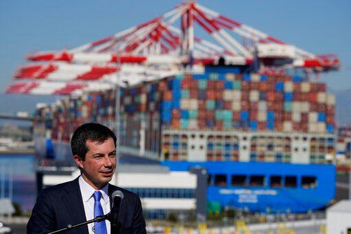 Transportation Secretary Pete Buttigieg speaks during a news conference to discuss the supply chain issues at the Port of Long Beach in Long Beach, Calif., Tuesday, Jan. 11, 2022. (AP Photo/Jae C. Hong)    PHOTO CREDIT: Jae C. Hong