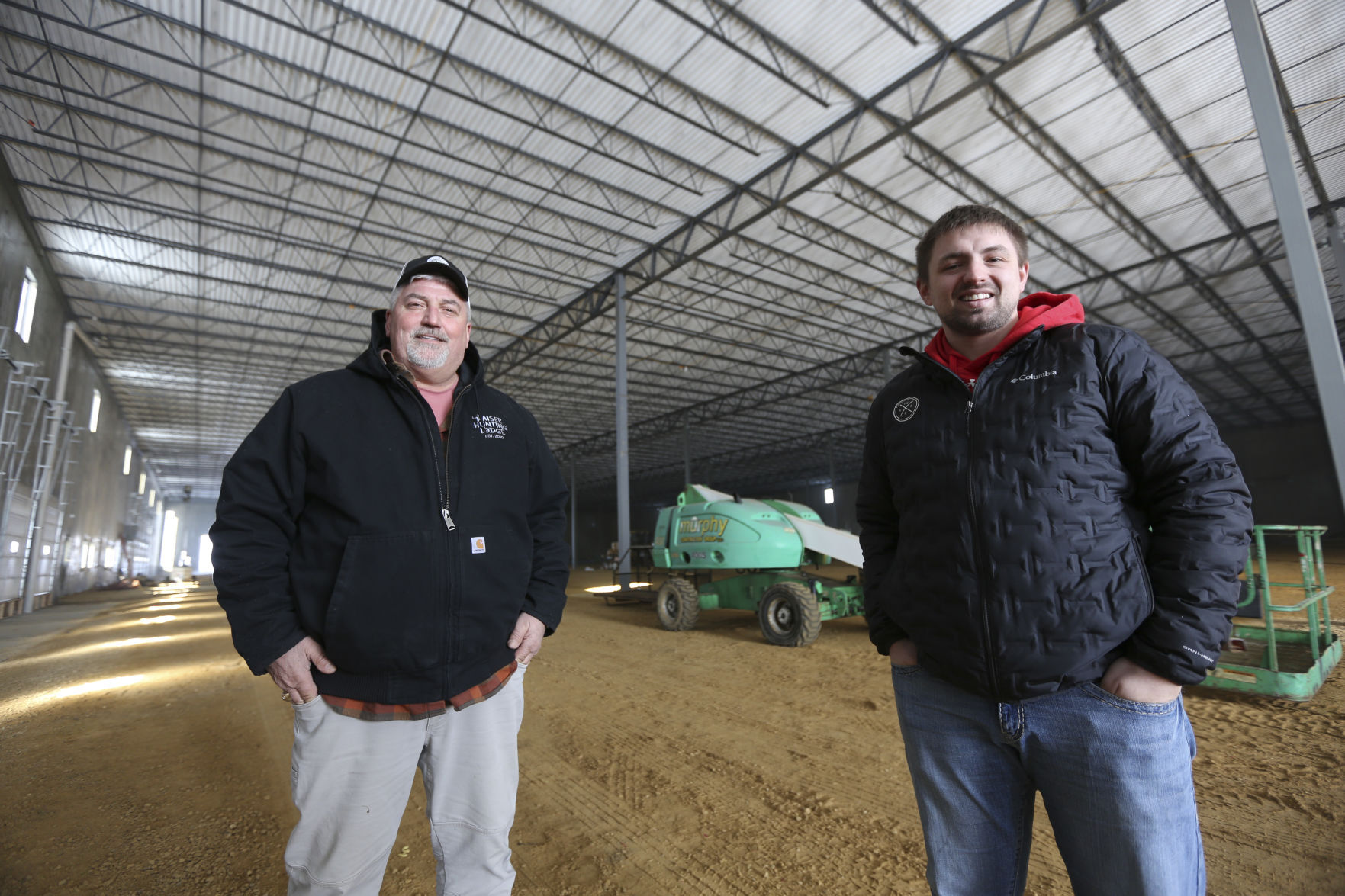 Jeff Kaiser (left) and his son, Corey Kaiser, along with two business partners, have invested more than $5 million to construct a 100,000-square-foot warehouse facility located in Kieler, Wis.    PHOTO CREDIT: Dave Kettering