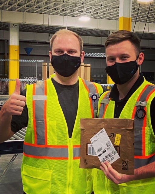 Site Lead Louie Oswald (left) and Area Manager Max Flynn (right) of the Amazon delivery station that opened in Dubuque earlier this month. The photo shows Oswald and Flynn on the facility