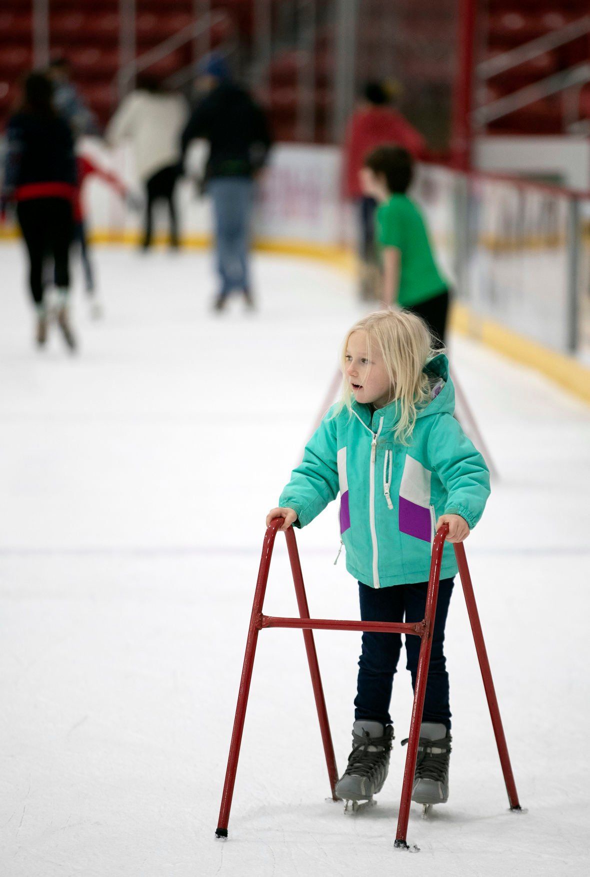 Bekah Sylvester, 5, of Dubuque, enjoys her first time ice skating at the ice center in December.    PHOTO CREDIT: Stephen Gassman