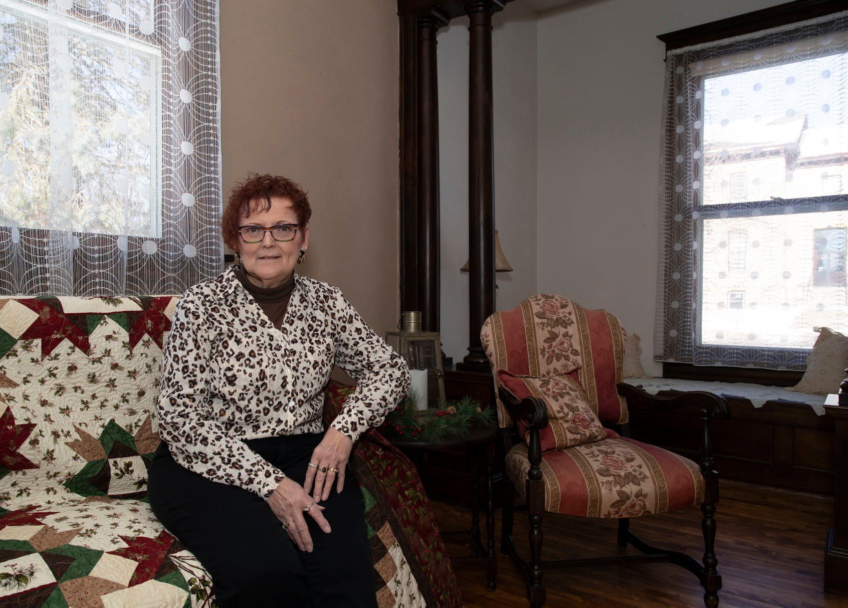 Owner Carol Long sits inside the historic DeWitt House which she plans to rent out as "A Stitch in Time" retreat locale in Platteville, Wis., on Friday, Jan., 28, 2022.    PHOTO CREDIT: Stephen Gassman
