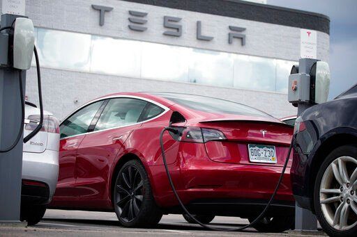 Tesla is recalling nearly 54,000 vehicles because their “Full Self-Driving” software lets them roll through stop signs without coming to a complete halt.    PHOTO CREDIT: David Zalubowski