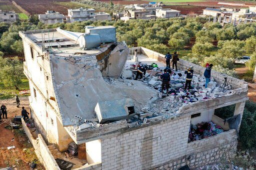 People inspect a destroyed house following an operation by the U.S. military in the Syrian village of Atmeh, in Idlib province, Syria. U.S. special forces carried out what the Pentagon said was a large-scale counterterrorism raid in northwestern Syria early today.    PHOTO CREDIT: Ghaith Alsayed