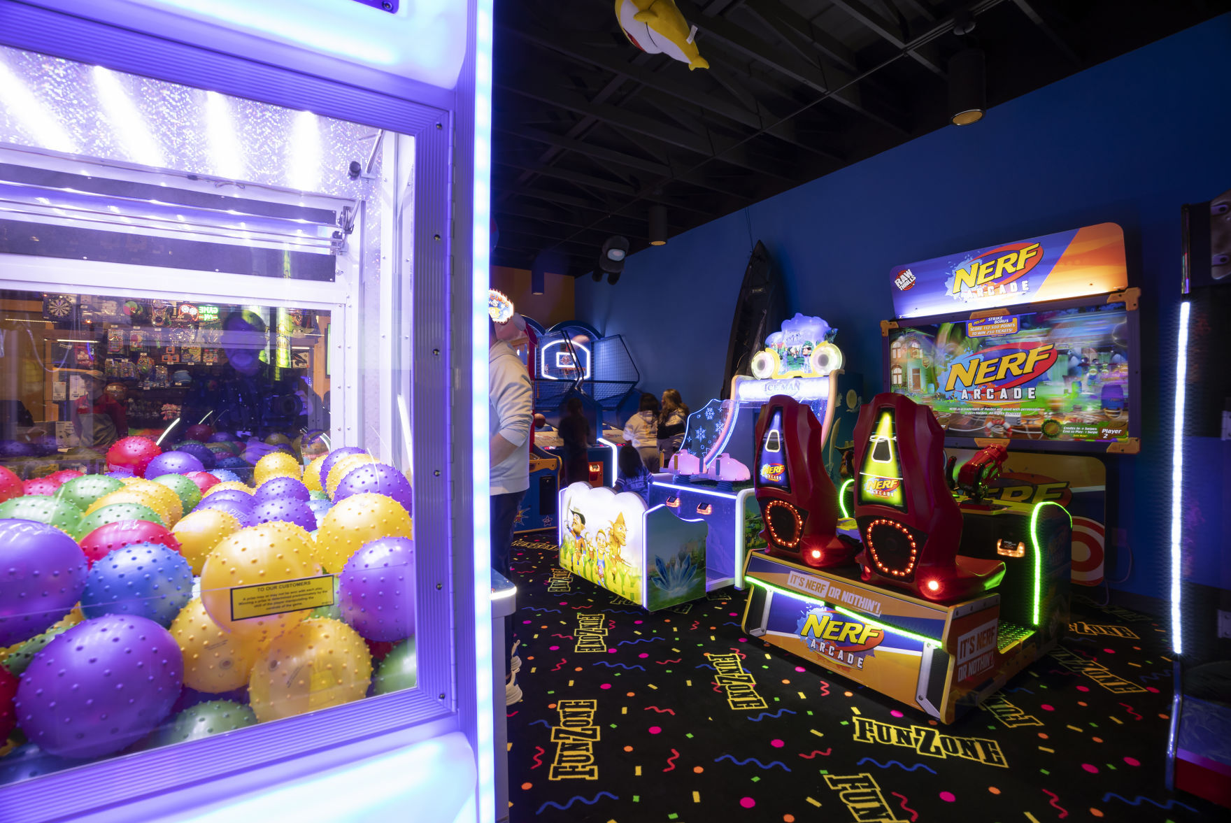 Customers enjoy the arcade games in the new FunZone at Pizza Ranch in Dubuque on Thursday, Feb. 10, 2022.    PHOTO CREDIT: Stephen Gassman