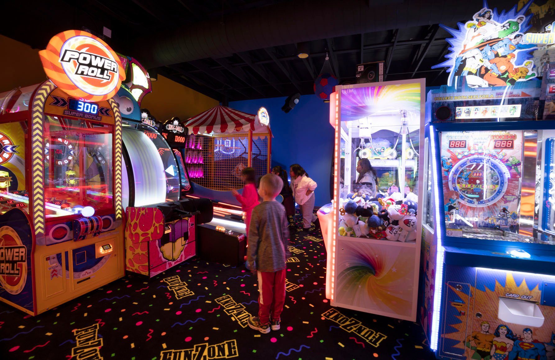 Customers enjoy the arcade games in the new FunZone at Pizza Ranch in Dubuque on Thursday.    PHOTO CREDIT: Stephen Gassman