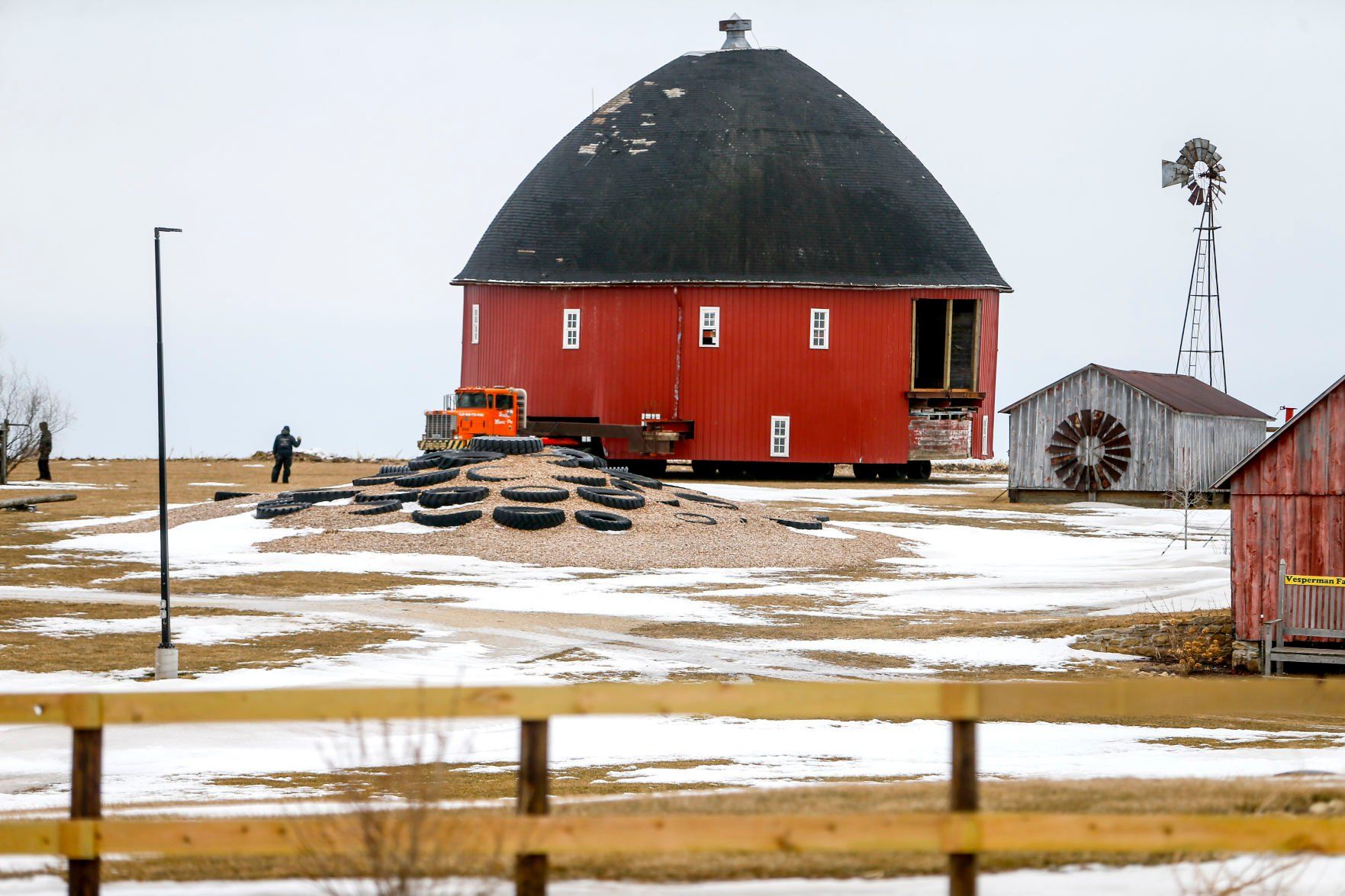 A 60-foot round barn arrives at its new home at Vesperman Farms in Lancaster, Wis., on Thursday. The barn had been relocated from a site several miles away in a rural area.    PHOTO CREDIT: Dave Kettering