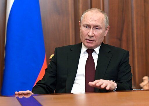 Russian President Vladimir Putin addresses the nation in the Kremlin in Moscow, Russia, Monday, Feb. 21, 2022. Russia